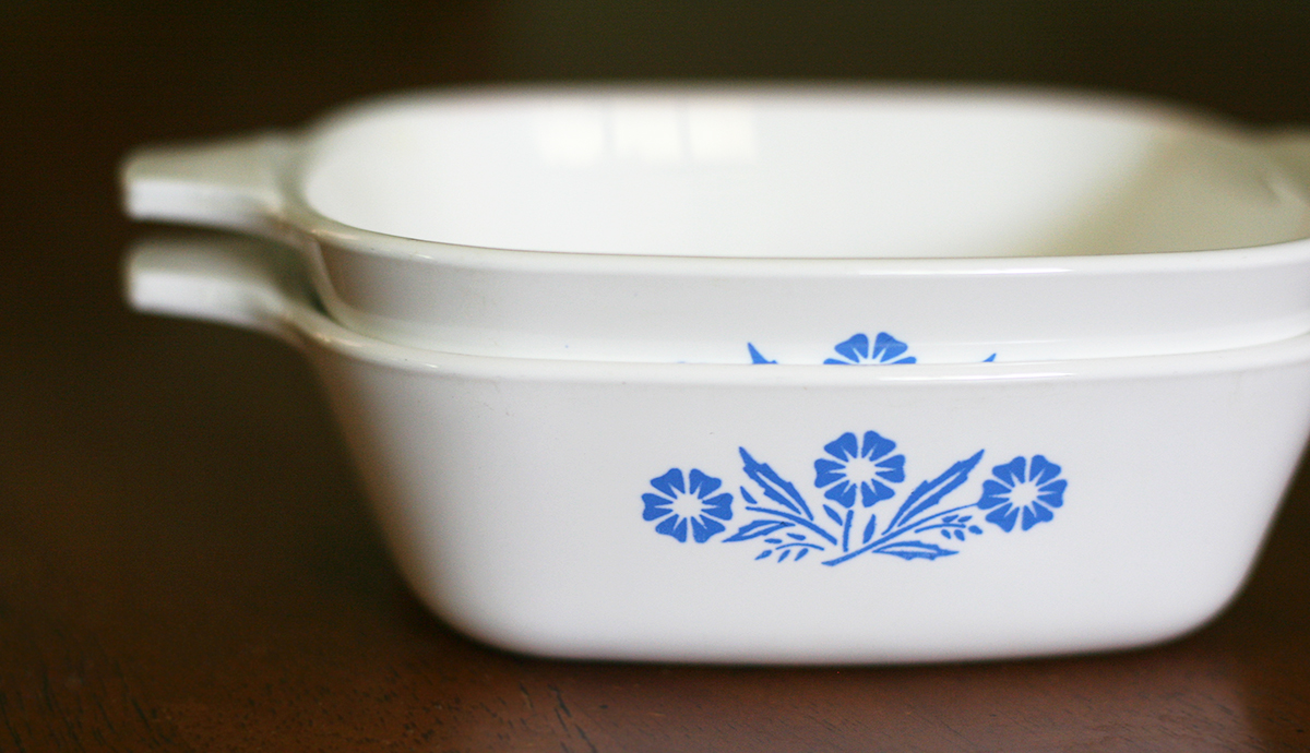 Vintage Blue Cornflower Corning Ware Pyroceram Petite Pan Dishes Stacked in Kitchen
